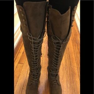 New. Taupe colored lace up boots.